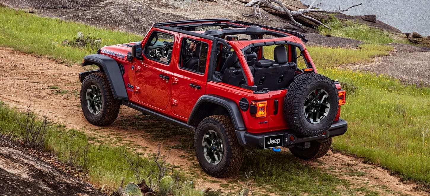 The 2024 Jeep Wrangler continues to deliver its iconic off-road capability with modern updates in comfort and technology. While it excels in rugged terrain, some may find its on-road refinement and safety features lacking compared to more conventional SUVs.