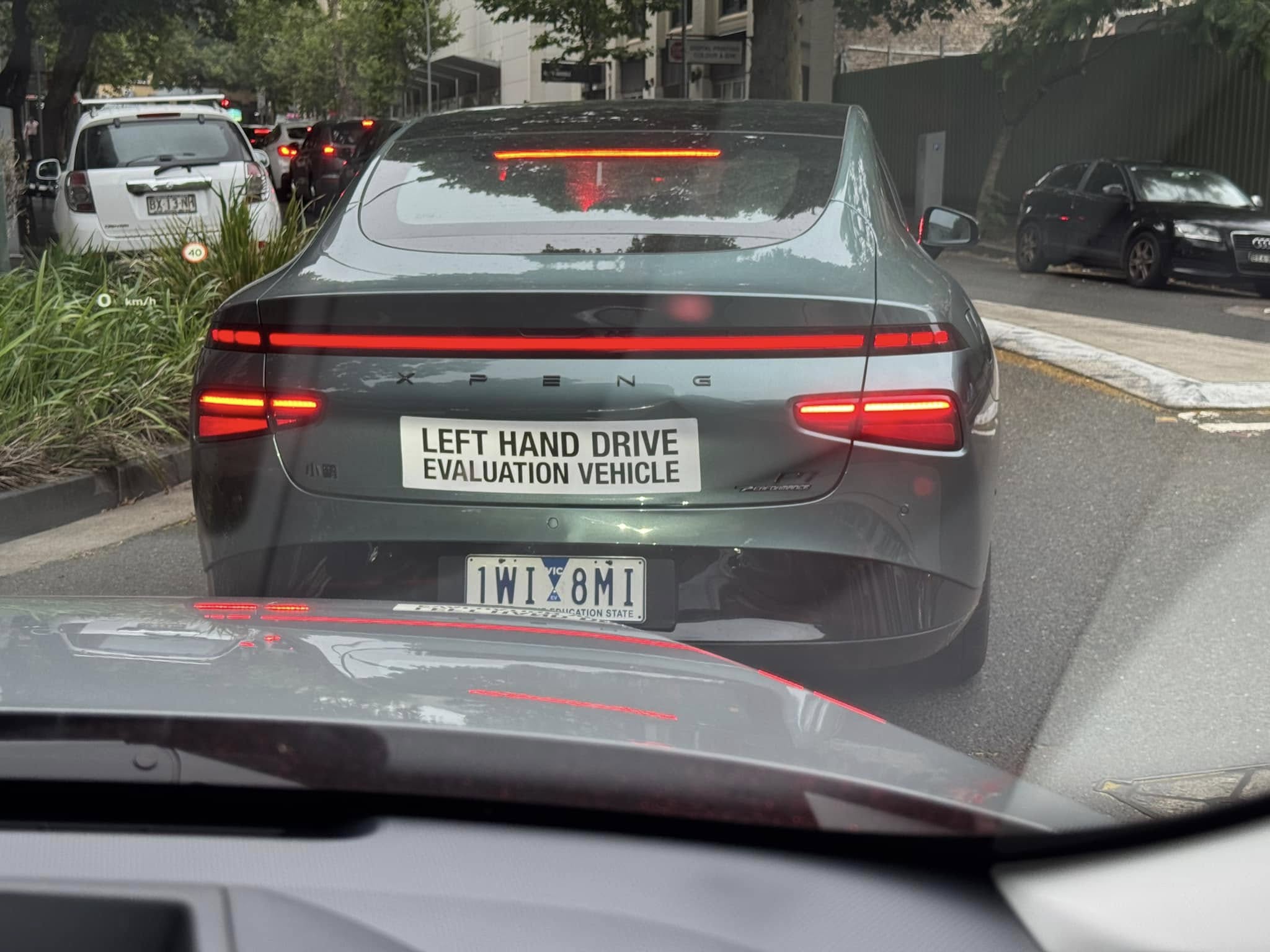 Xpeng P7 Performance P7+ Back end spotted in Sydney with Left Hand Drive sign