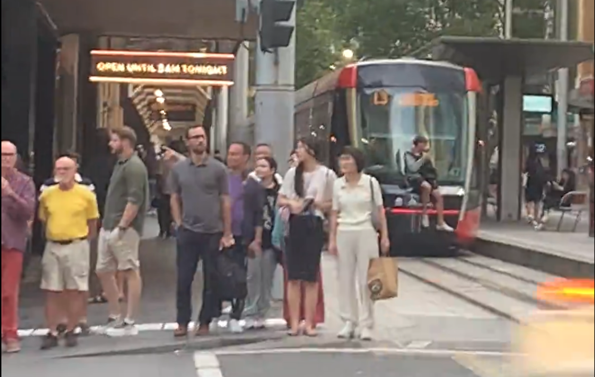 Sydney Daredevil Hitches a Ride on the Back of a Tram